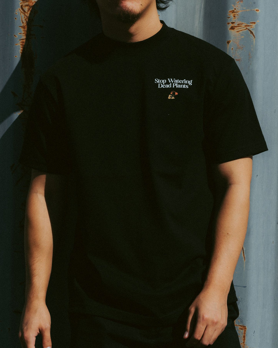 stop-watering-dead-plants-tee-