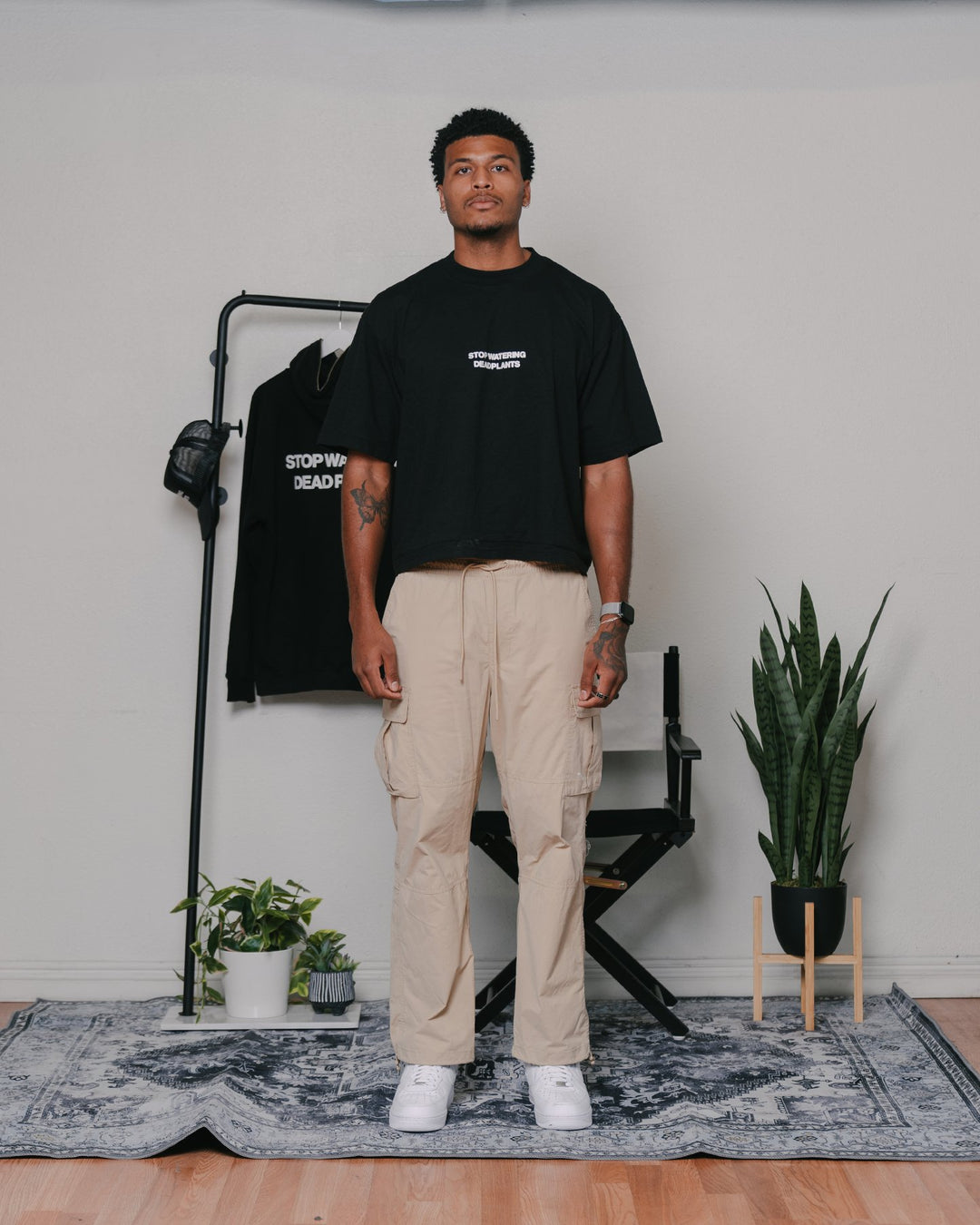 Stop Watering Dead Plants 2.0 Black Oversized Cropped Tee - trainofthoughtcollective