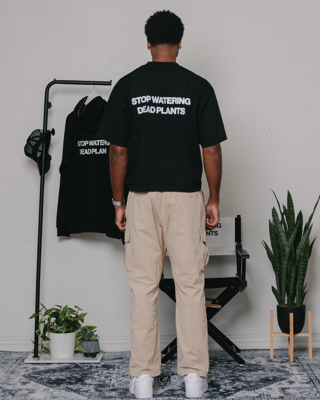 Stop Watering Dead Plants 2.0 Black Oversized Cropped Tee - trainofthoughtcollective