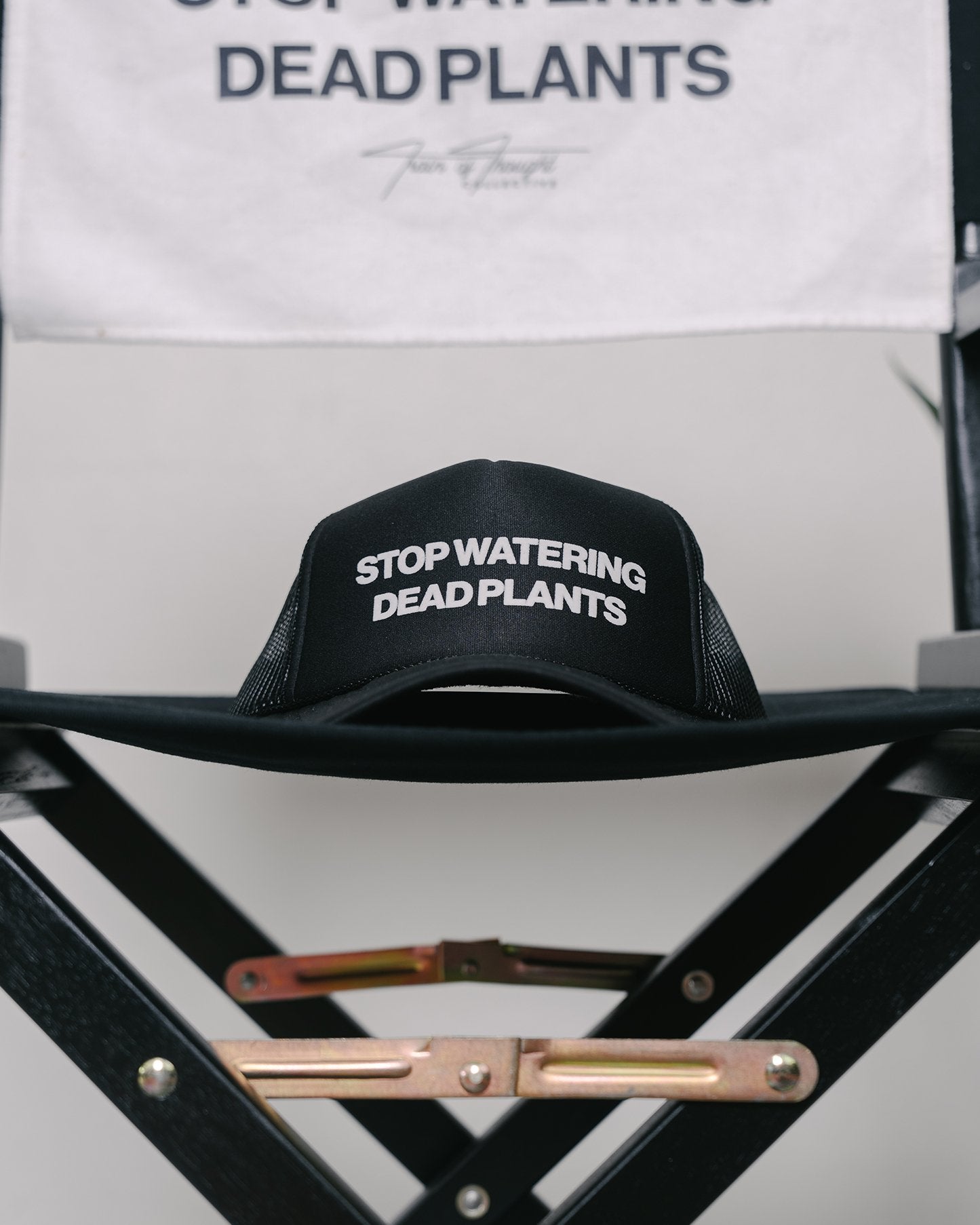 Stop Watering Dead Plants 2.0 Trucker Hat - trainofthoughtcollective