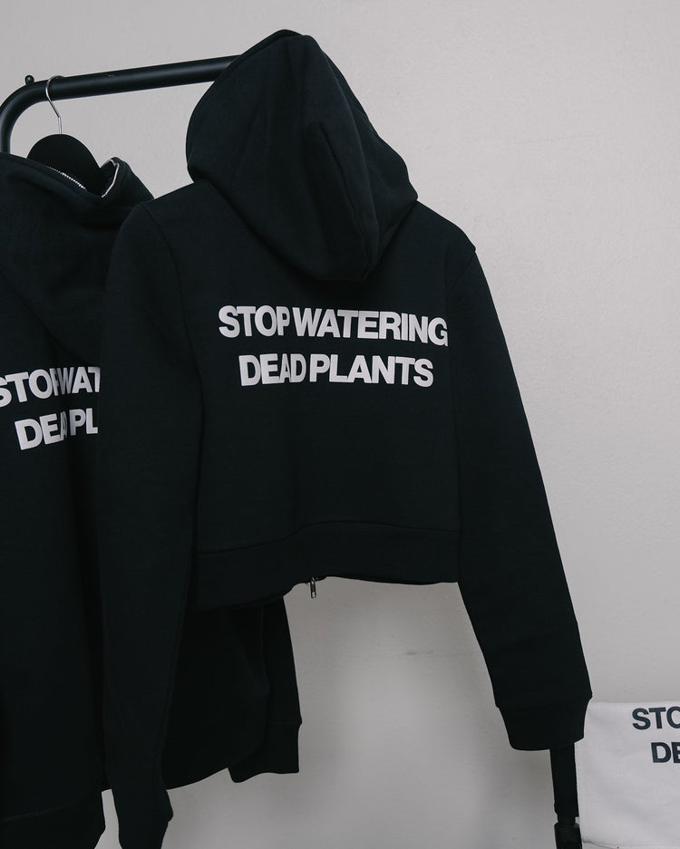 Stop Watering Dead Plants 2.0 Women's Cropped Full Zip Body Bag Hoodie - trainofthoughtcollective