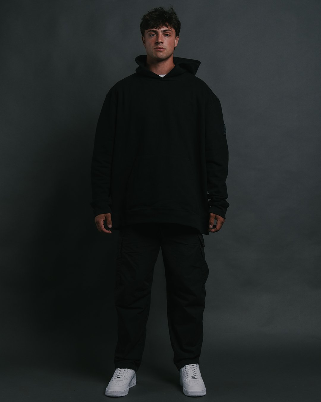 UC 16oz Black Hoodie *Exclusive Release - trainofthoughtcollective