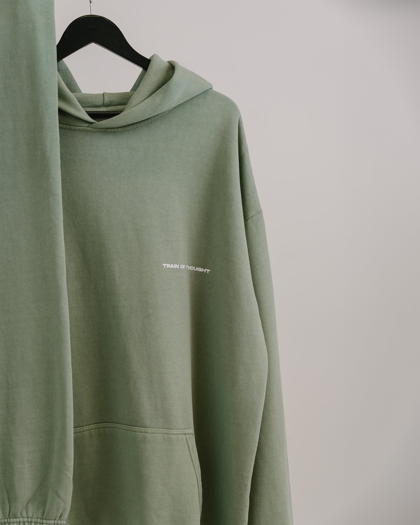 Necessary Lounge Oil Green Hoodie - trainofthoughtcollective